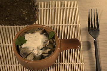Image showing closeup of mushroom stew, with sour cream