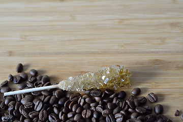 Image showing  sugar on a stick with coffee beans