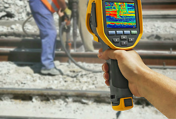 Image showing Recording with Infrared camera Two Workers