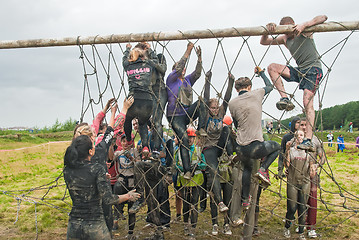 Image showing Team storms net wall in extrim race. Tyumen.Russia