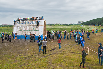 Image showing Teams storm big wall in extrim race. Tyumen.Russia