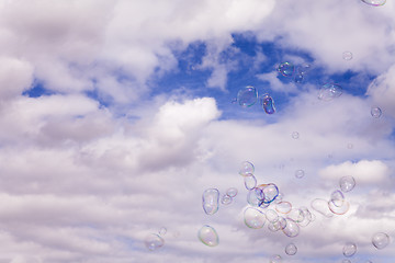 Image showing Soap Bubbles Flying In A Gust Of Wind\r