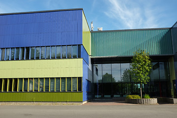 Image showing modern building with blue and green color wall 