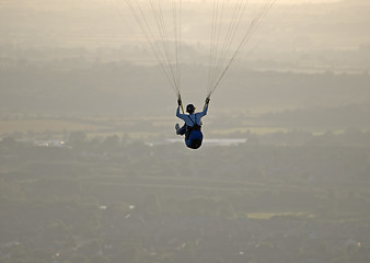 Image showing Paraglider high in the sky