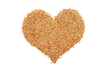 Image showing Golden linseed in a heart shape