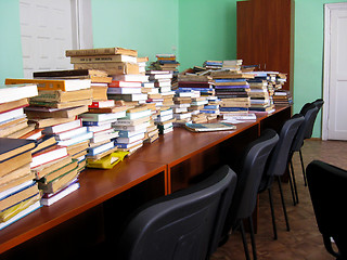 Image showing heaps of books in the library