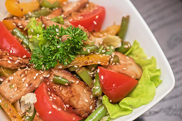 Image showing Warm salad with chicken