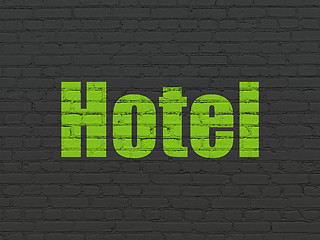 Image showing Tourism concept: Hotel on wall background