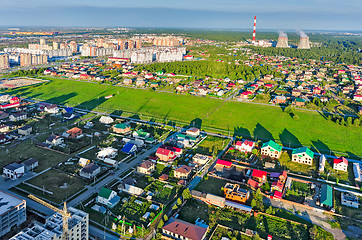 Image showing Residential area over city plant background.Tyumen