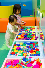 Image showing Chinese Childrens playing puzzle