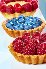 Image showing fruit tartlets with raspberries and blueberries 