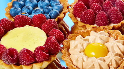 Image showing fruit tartlets with raspberries and blueberries 