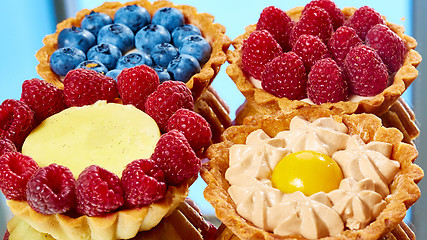 Image showing fruit tartlets with raspberries and blueberries 