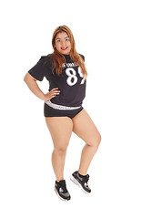Image showing Girl standing in black sports outfit.