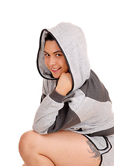 Image showing Pretty girl in gray hoodie in profile.
