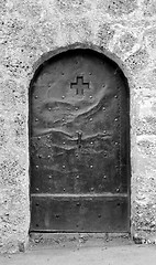 Image showing Old studded metal door