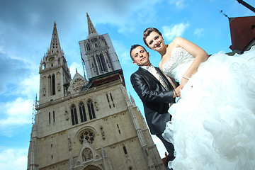 Image showing Low angle view of newlyweds 