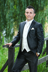 Image showing Groom posing in nature