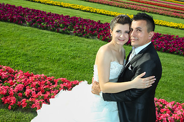 Image showing Bride and groom on lawn