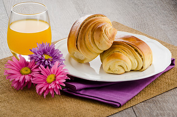 Image showing Croissants with orange juice 