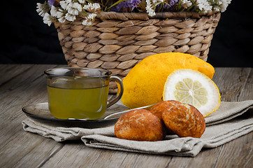 Image showing Lemon tea and cookies