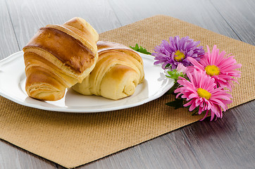 Image showing Croissants with orange juice 