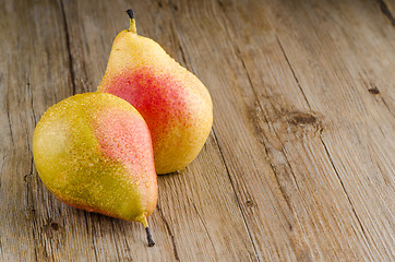 Image showing Pears in a old wooden table