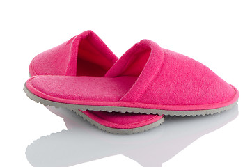 Image showing A pair of pink slippers