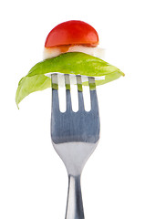 Image showing Caprese salad on the fork