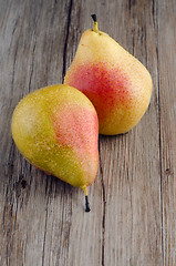 Image showing Pears in a old wooden table