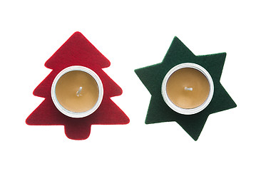 Image showing Red star and green pine tree  Christmas decorations with candles