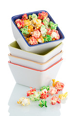 Image showing Pile of ceramic bowls of popcorn