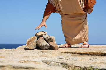 Image showing Man by stones  concept Sin Punishment