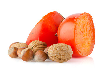 Image showing Ripe persimmons and nuts