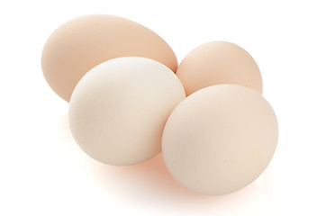 Image showing Four eggs on white 