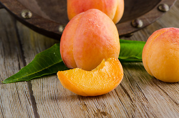 Image showing Apricots with leaves