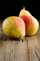 Image showing Pears in a old wooden table