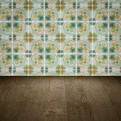 Image showing Wood table top and blur vintage ceramic tile pattern wall