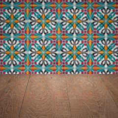 Image showing Wood table top and blur vintage ceramic tile pattern wall