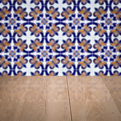 Image showing Wood table top and blur vintage ceramic tile pattern wall