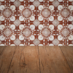 Image showing Wood table top and blur vintage ceramic tile pattern wall