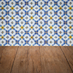 Image showing Wood table top and blur vintage ceramic tile pattern wall