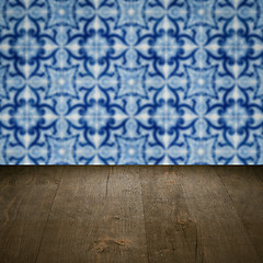 Image showing Wood table top and blur vintage ceramic tile pattern wall