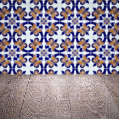 Image showing Wood table top and blur vintage ceramic tile pattern wall