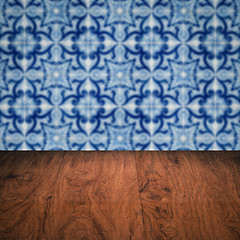 Image showing Wood table top and blur vintage ceramic tile pattern wall