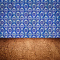 Image showing Wood table top and blur vintage ceramic tile pattern wall