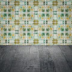 Image showing Wood table top and blur vintage ceramic tile pattern wall