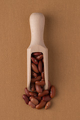 Image showing Wooden scoop with red beans