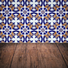 Image showing Wood table top and blur vintage ceramic tile pattern wall