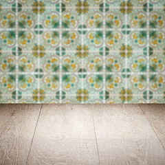 Image showing Wood table top and blur vintage ceramic tile pattern wall